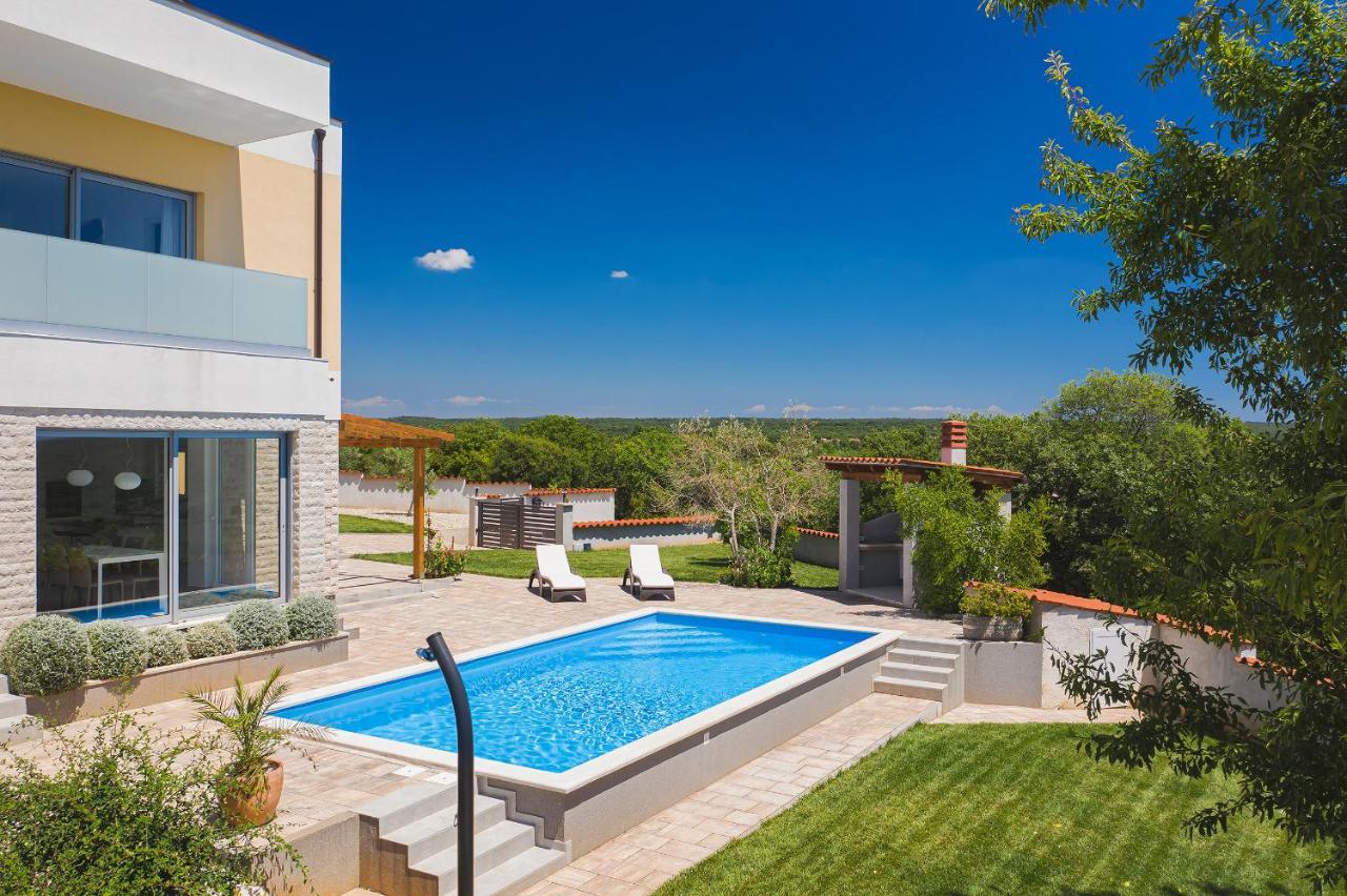 Villa White Barbariga Exterior photo