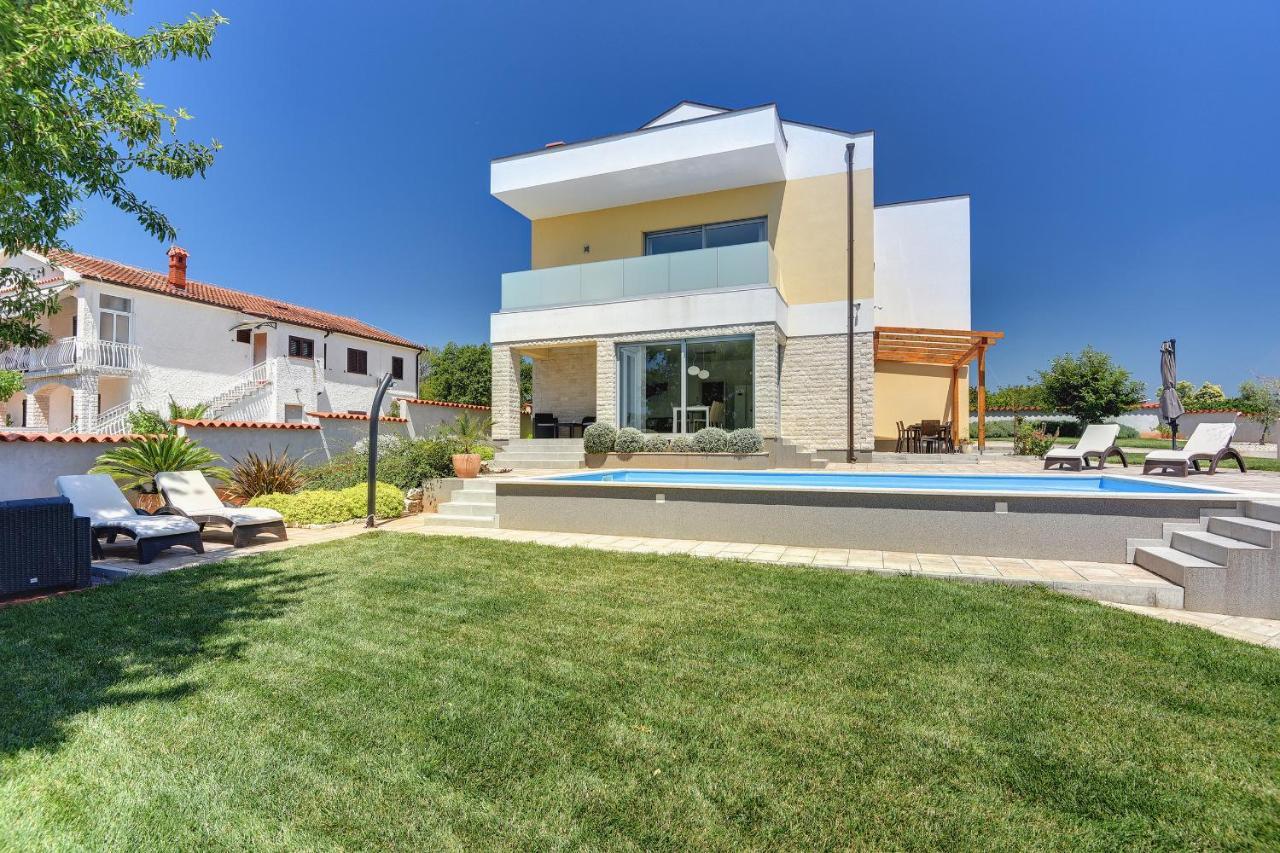 Villa White Barbariga Exterior photo